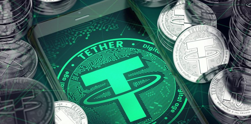 Tether-USDT-logo-in-green-surrounded-by-silver-coins.jpg