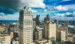 cityscape-detroit-sunlight-dark-cloudy-sky-daytime-scaled.jpg