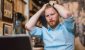 frustrated-man-looking-at-stocks-tanking-on-his-laptop-iStock-898249816.jpg