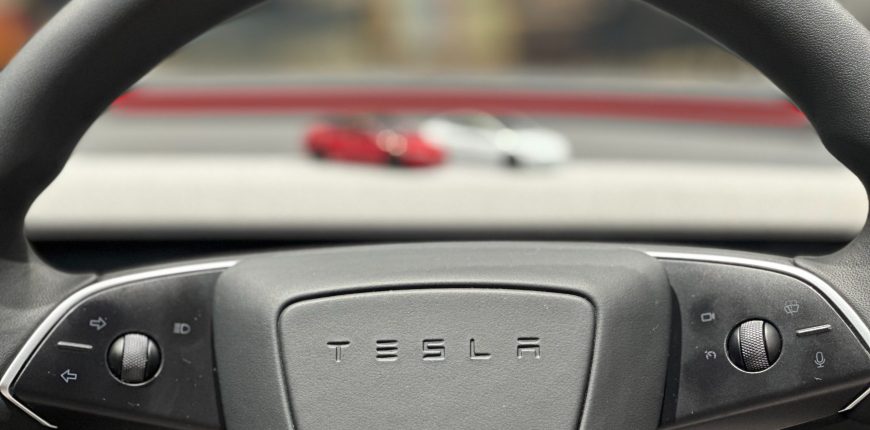 tesla-steering-wheel-logo-scaled.jpeg