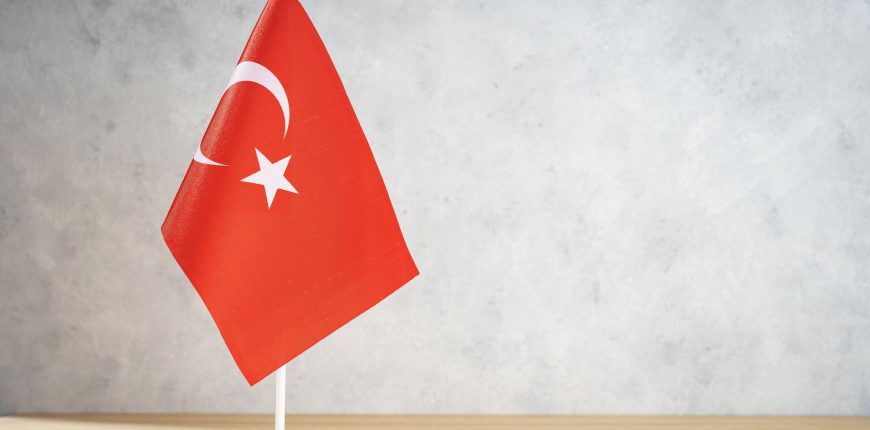 turkey-table-flag-on-white-textured-wall.jpg