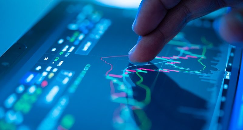 Businessman20checking20stock20market20data20resized.jpg