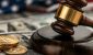 gavel-on-dollar-bills-with-bitcoin-and-us-flag-background.jpg