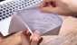 hand_opening_a_check_in_an_envelope.width-600.jpg