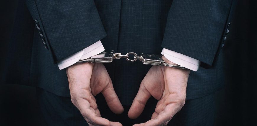 handcuffs_arrest_-_photo_146463904_c_stanislaw_mikulski_-_dreamstime.com_.jpg