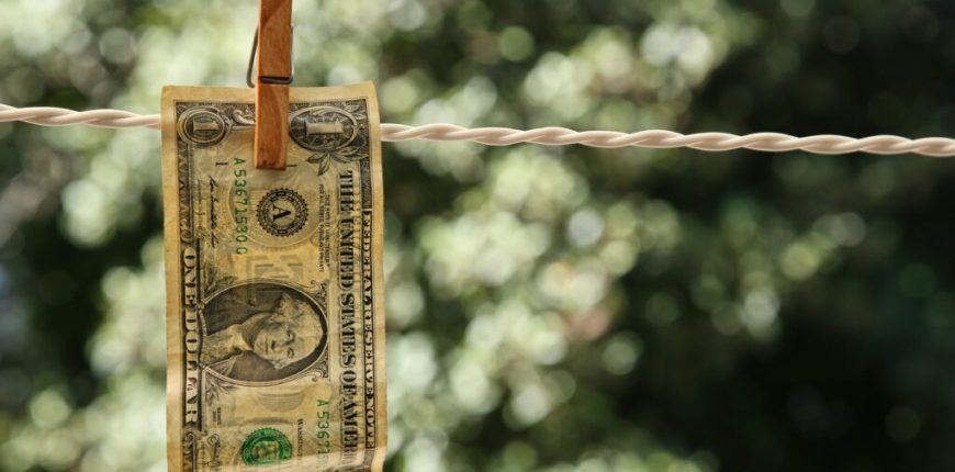 selective-focus-shot-dollar-bill-hung-from-wire-with-clothespin-1024x683.jpg