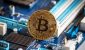 BTC-coin-on-motherboard.jpg