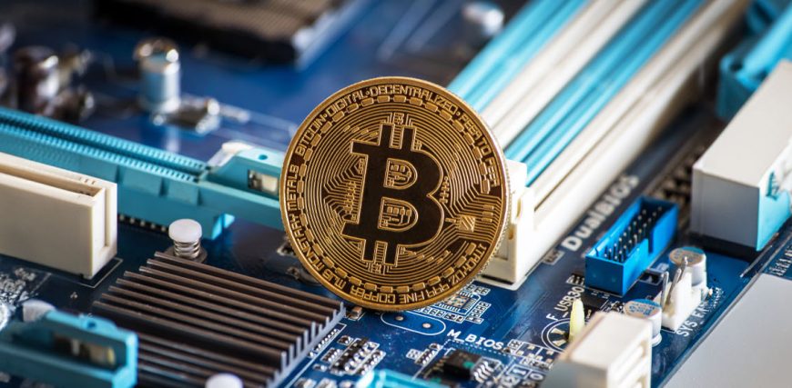 BTC-coin-on-motherboard.jpg