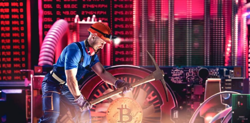 crypto-miner-mining-bitcoin-surrounded-by-computer-hardware.jpg