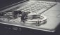 handcuffs-on-laptop-cyber-crime-concept.jpg