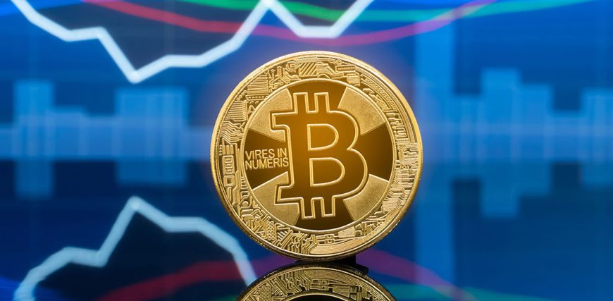 BTC-coin-over-blue-financial-chart.jpg