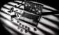 crypto-fraud-black-and-white-laptop-misterious-coins.jpg