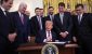 genius-act-signing.jpg