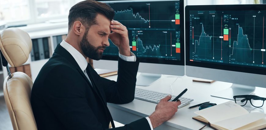 concerned-investor-at-trading-desk.jpg