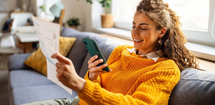 investing-bills-retirement-online-smartphone-automated-woman-couch_iStock-2007594417.jpg