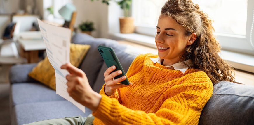 investing-bills-retirement-online-smartphone-automated-woman-couch_iStock-2007594417.jpg