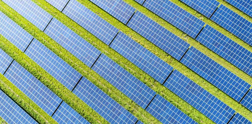 aerial-view-of-photovoltaic-plant-1056352042-b098826fc9b44b0480762d8231c0410e.jpg