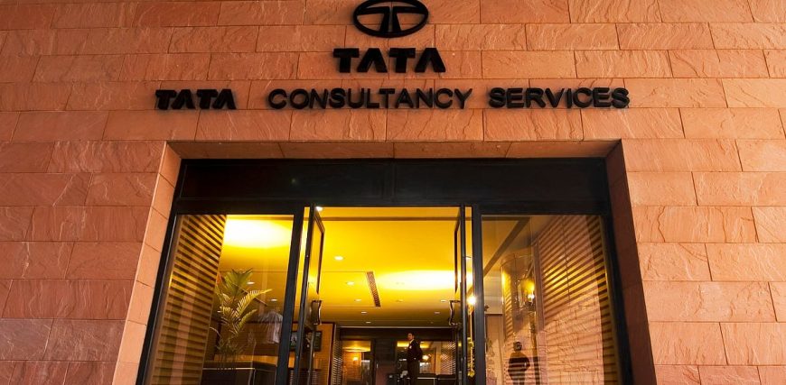 bloombergquint2F2025-01-102Fhxwgaa9e2FTilt20up20of20a20TCS20office20entrance.20Source20C.jpeg
