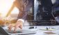 businessman-working-using-laptop-computer-with-strategy-and-growth-of-business-on-screen-873806068-2.jpeg