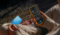 108193606-1756898318402-phone-in-hand-wth-one-card.png