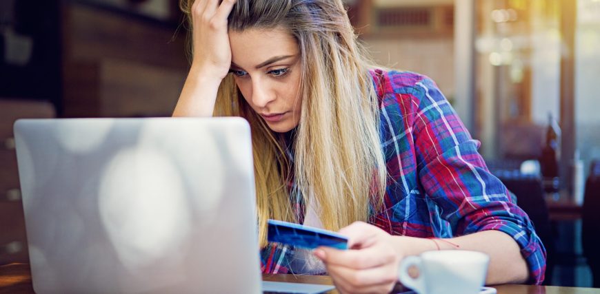 facepalming-investor-sits-at-desk-with-computer.jpg