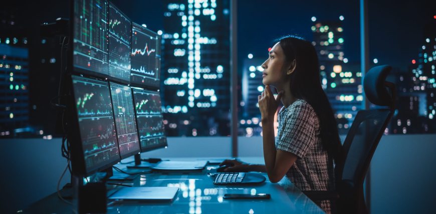 investor-staring-at-trading-screen-at-night.jpg