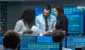 three-people-debating-on-stock-data-information.jpg