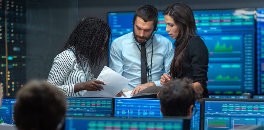 three-people-debating-on-stock-data-information.jpg