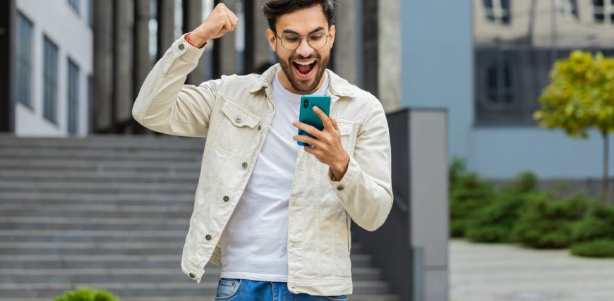 urlhttps3A2F2Fg.foolcdn.com2Feditorial2Fimages2F8439342Fyoung-smartphone-user-celebrating.j.jpeg