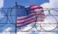 USA-Border-with-American-Flag-and-barbed-Wire.webp.webp