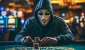 cp6225_person_wearing_an_anonymous_mask_playing_a_casino_game_o_149684ea_9217_4b6d_b771_7326b3c18feb.webp cp6225_person_wearing_an_anonymous_mask_playing_a_casino_game_o_149684ea_9217_4b6d_b771_7326b3c18feb.webp
