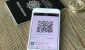 smartphone-displaying-qr-code-next-to-bitcoin-on-wooden-table.jpg smartphone-displaying-qr-code-next-to-bitcoin-on-wooden-table.jpg